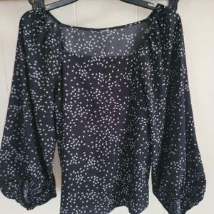 Black with white flowers flowy arms size small blouse
